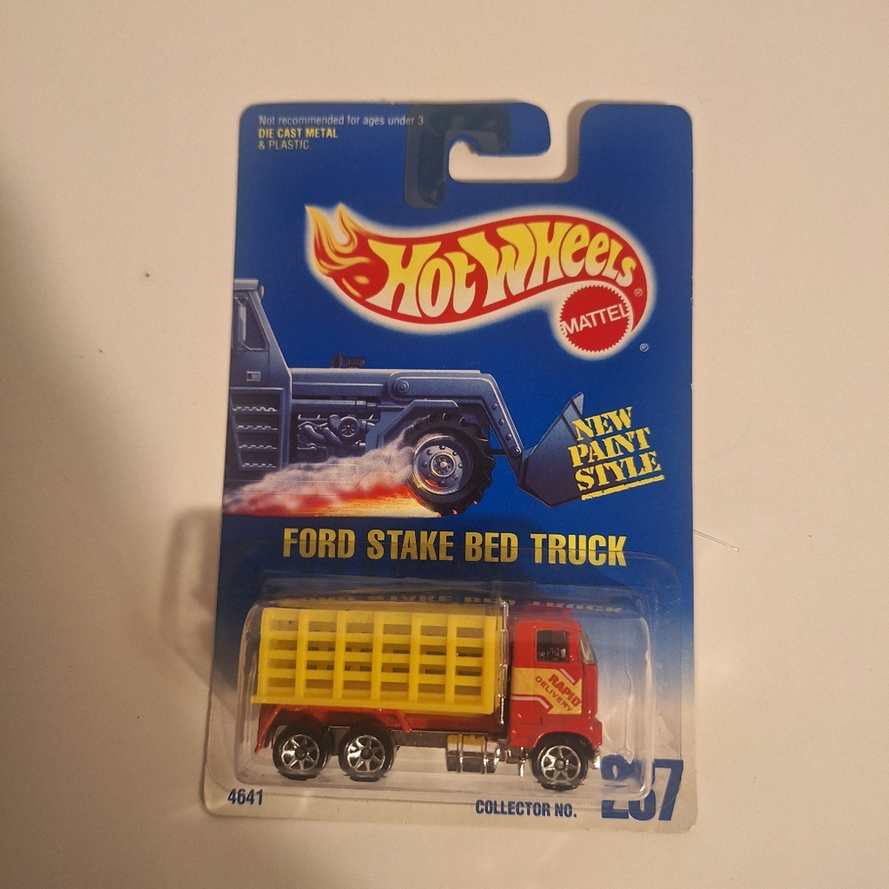 Red and Yellow Ford Stake Bed Truck‎